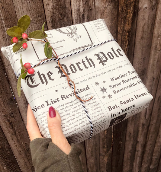 Wrap your gifts in a classic North Pole Newspaper sheet! 🎁
This eco-friendly, single-sided newsprint is filled with fun articles about Santa and his elves, making it a unique alternative to traditional wrapping paper. Use it for presents or as a festive touch with cookies and milk left out for Santa!
Key Details:
- Dimensions: 38.1 x 57.9 cm (15 x 22.8 in)
- Plastic-free, recycled, and vegan 🌍